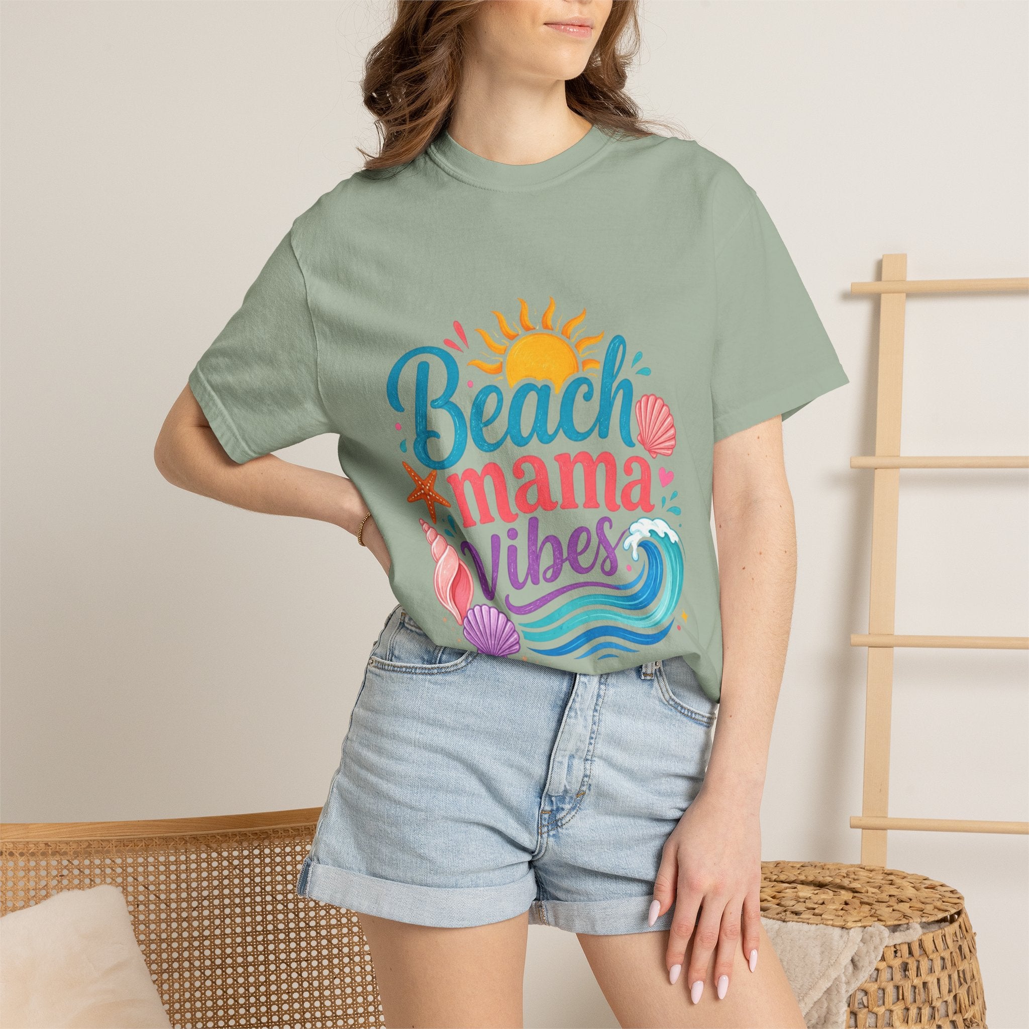 Beach Mama T-Shirt — Women's Coastal Mom Tee worn by a model, showcasing a relaxed fit and beach-themed graphic design.