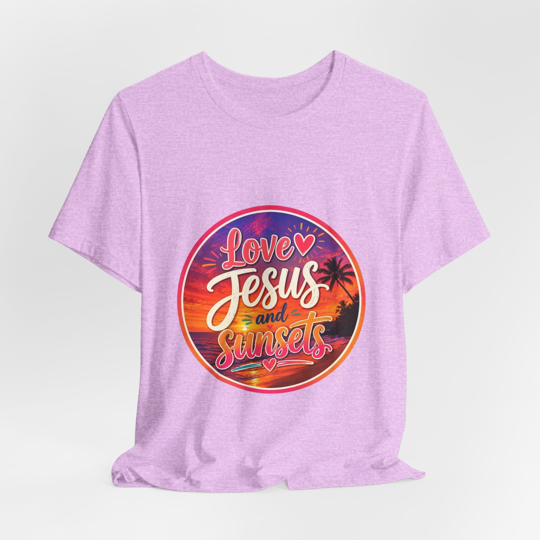 Christian Faith Palm Tree Sunset T-Shirt featuring sunset design with text 'Love Jesus and Sunsets' on a lilac tee.