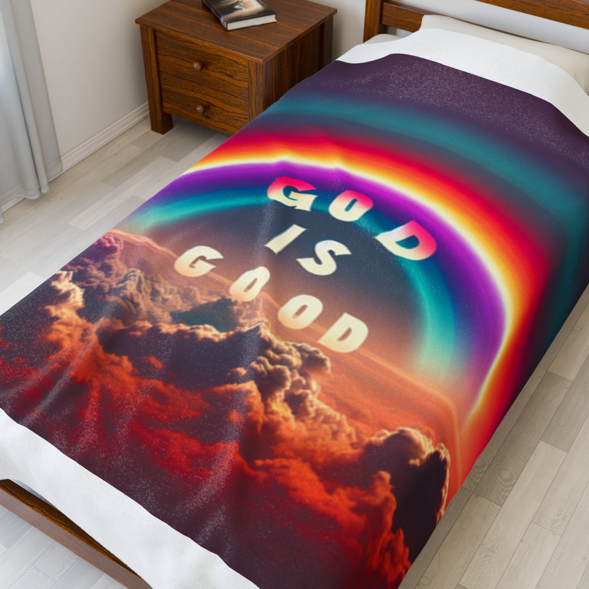 God is Good Rainbow Plush Blanket featuring a colorful rainbow design over clouds.