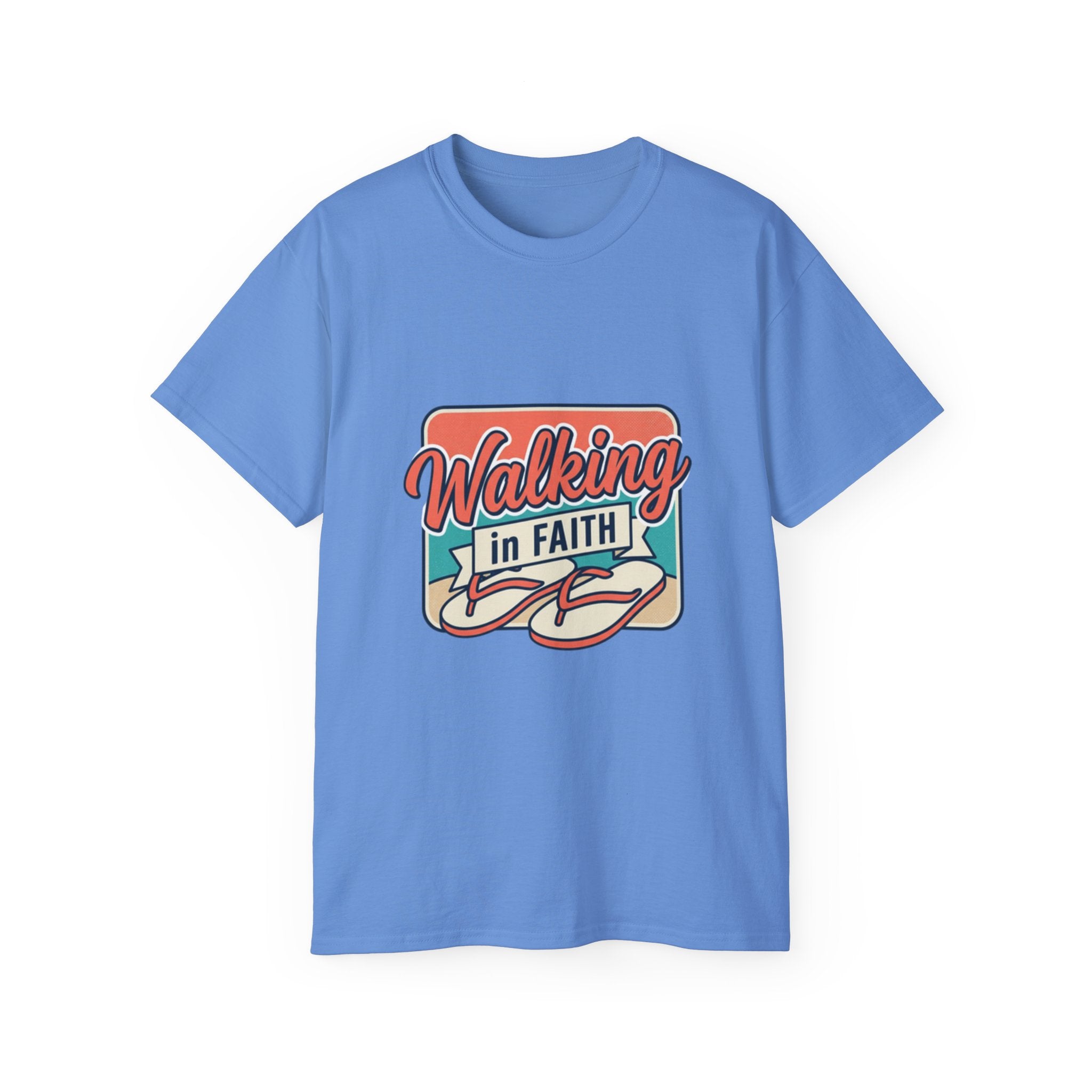 Walking in Faith Beach T-Shirt featuring a stylish design on a blue fabric background.
