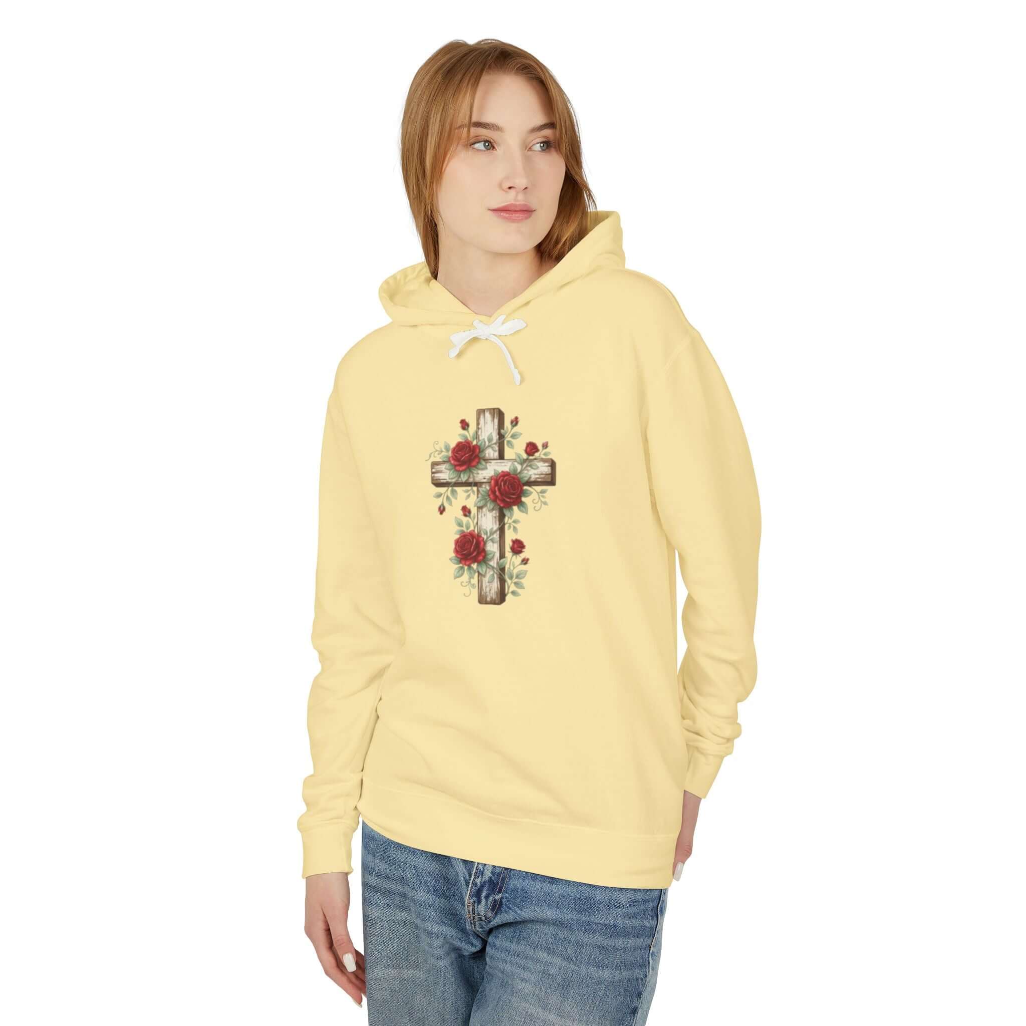 Christian sweatshirt featuring a Pale Yellow cross design, perfect for casual wear and expressing faith.