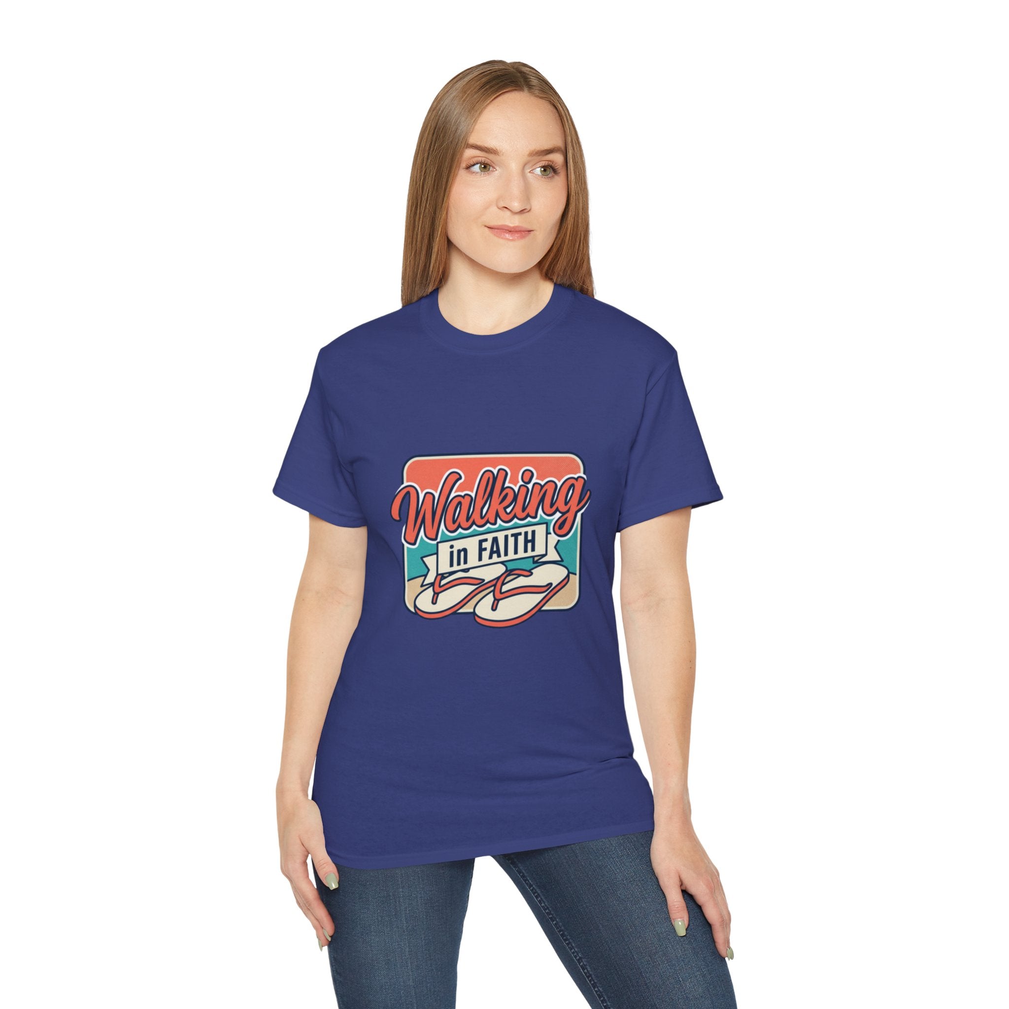 Walking in Faith Beach T-Shirt worn by a woman, featuring vibrant design and coastal theme.