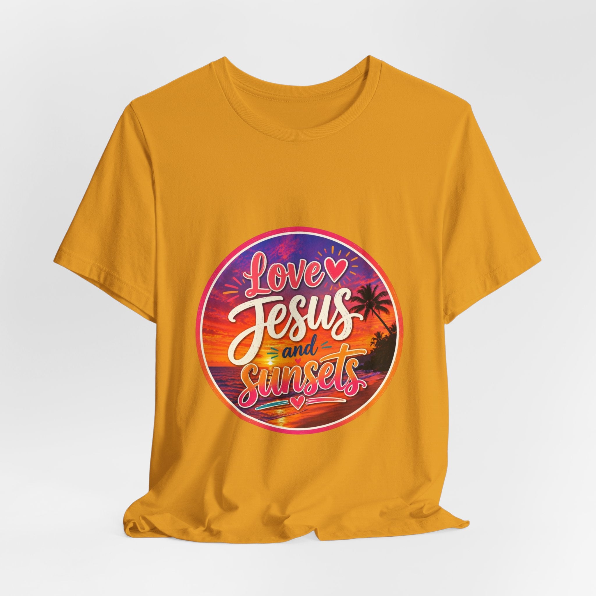 Christian Faith Palm Tree Sunset T-Shirt featuring 'Love Jesus and Sunsets' design on vibrant orange tee.