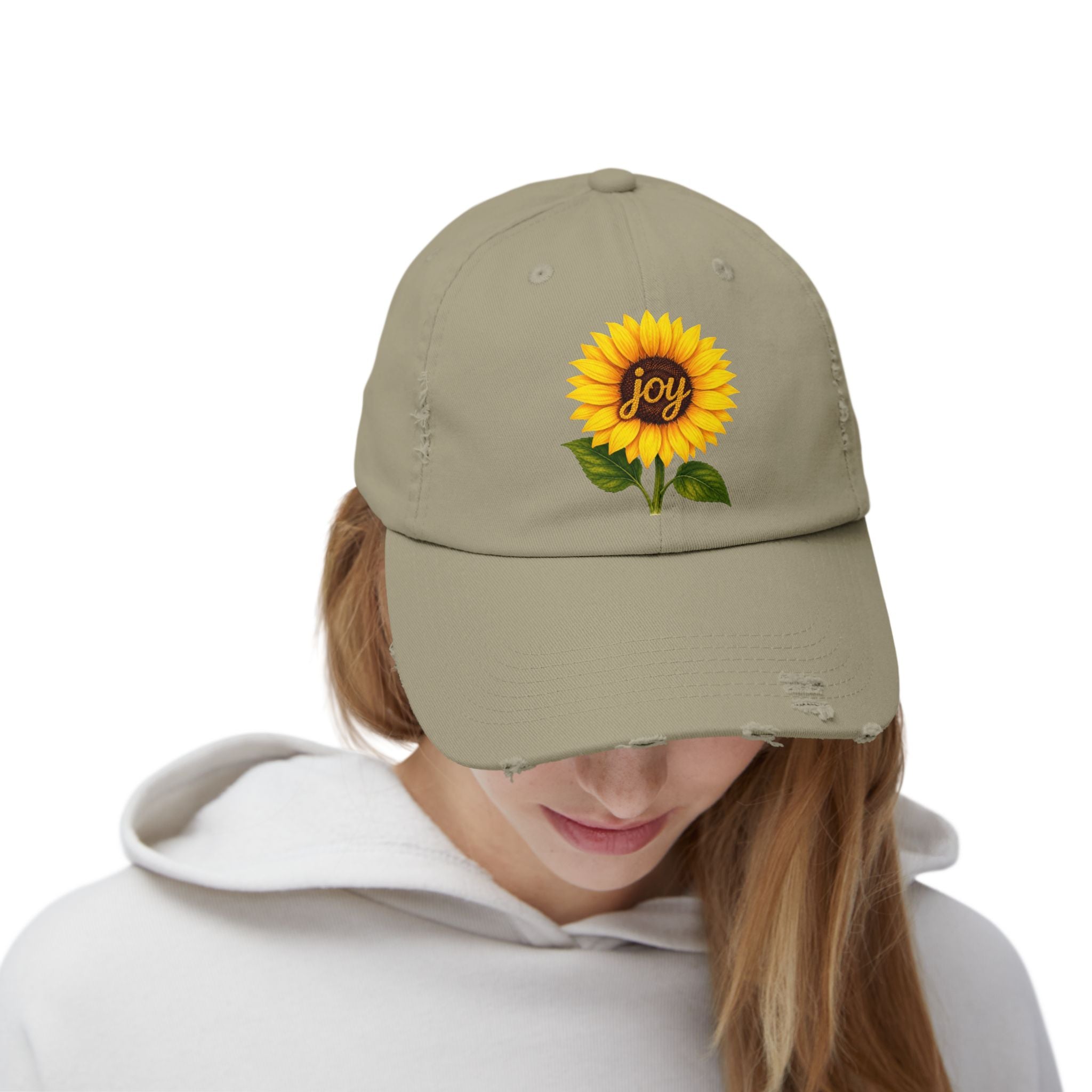 Sunflower Joy Distressed Cap featuring a hand-painted sunflower and the word 'joy' on a low-profile cap.