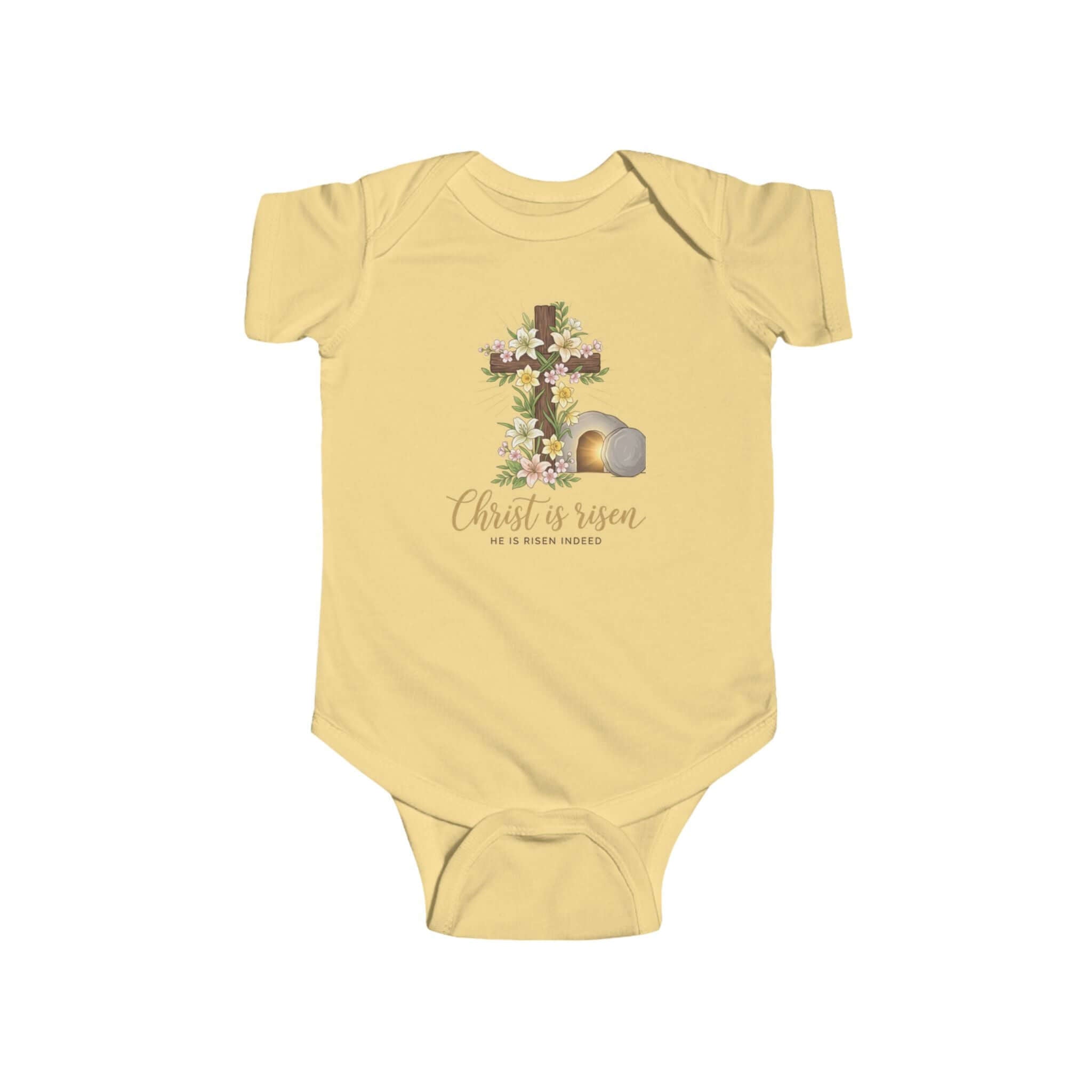 Infant apparel yellow a floral Easter design with a cross and the text 'Christ is risen' on a baby onesie.