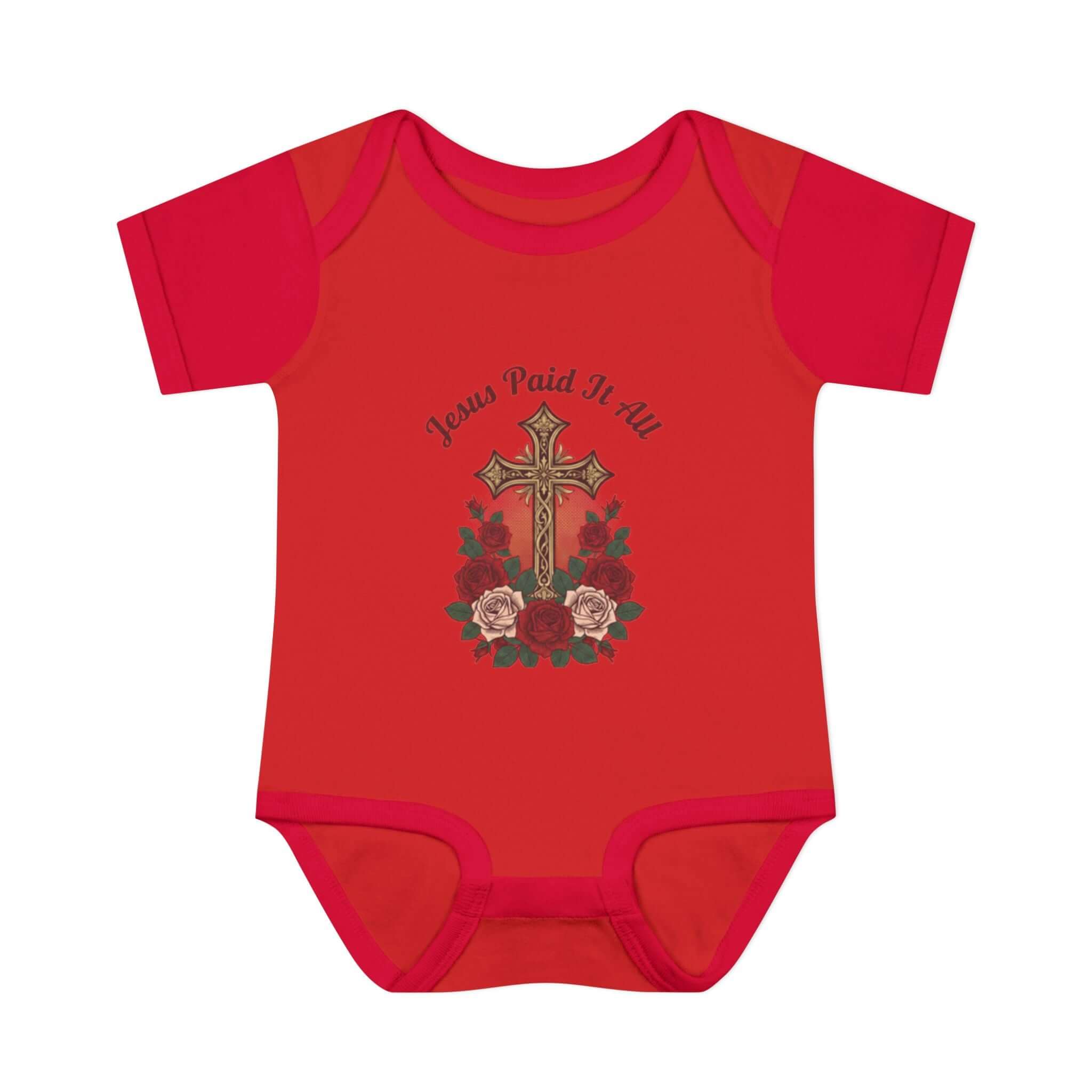 Baby Apparel red infant bodysuit featuring cross and "Jesus Paid It All" design with floral accents.