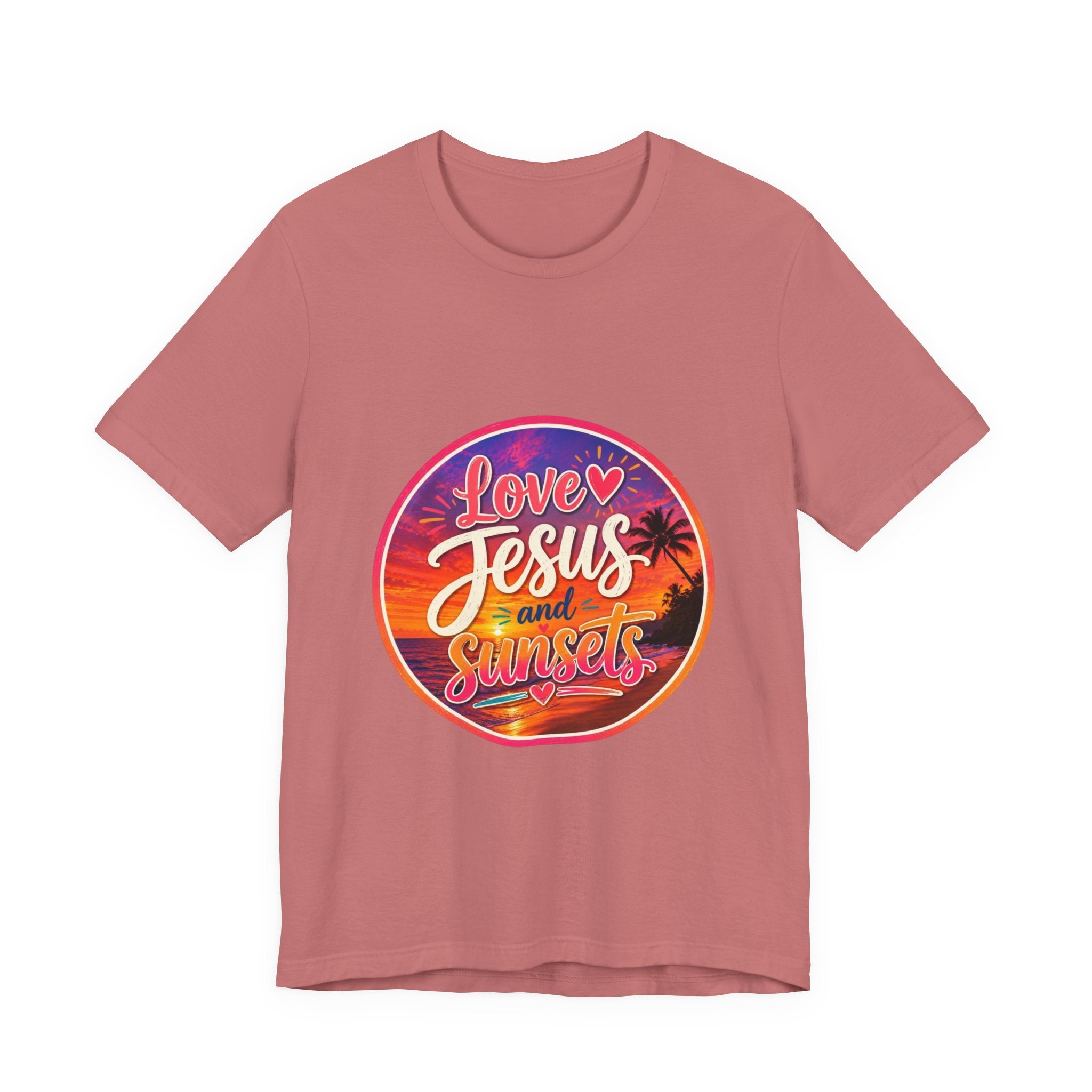Christian Faith Palm Tree Sunset T-Shirt featuring 'Love Jesus and Sunsets' print on a soft pink tee.