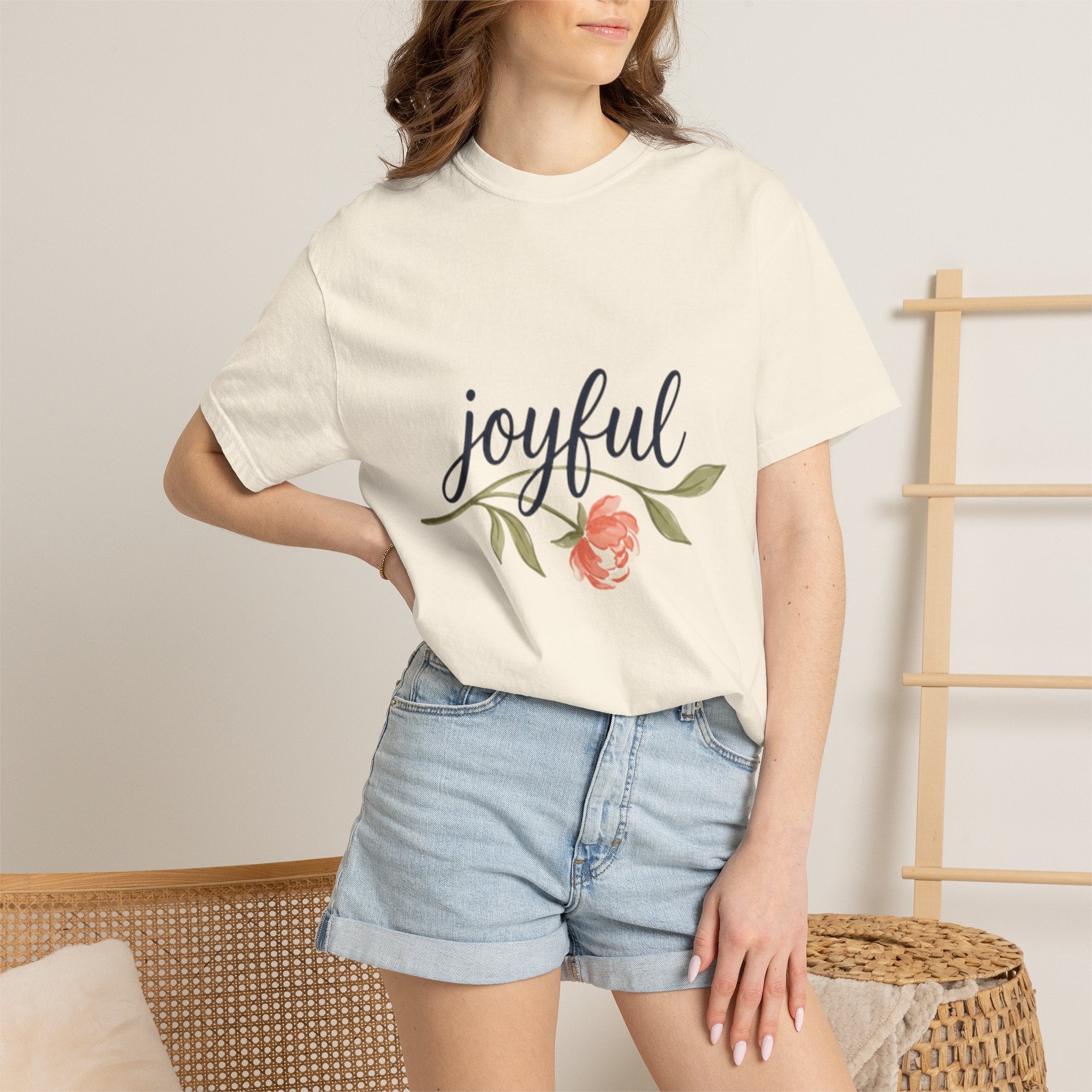Joyful Flower T-Shirt for Women displayed on model, featuring floral graphic and comfortable design.