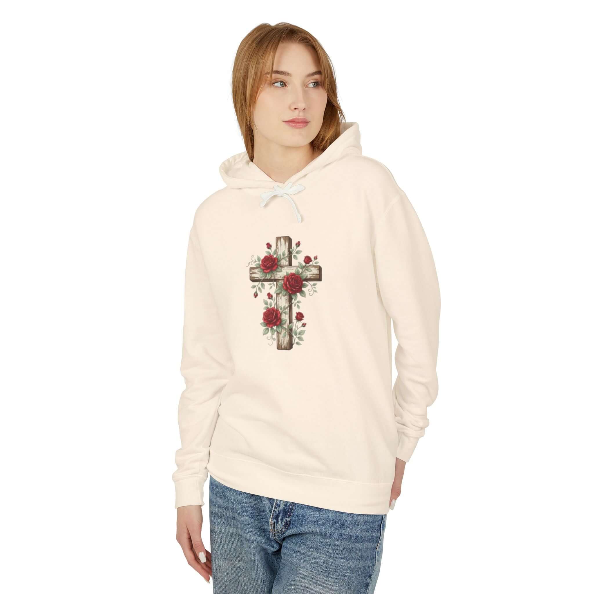 Christian sweatshirt featuring a Cream cross design, perfect for casual wear and expressing faith.