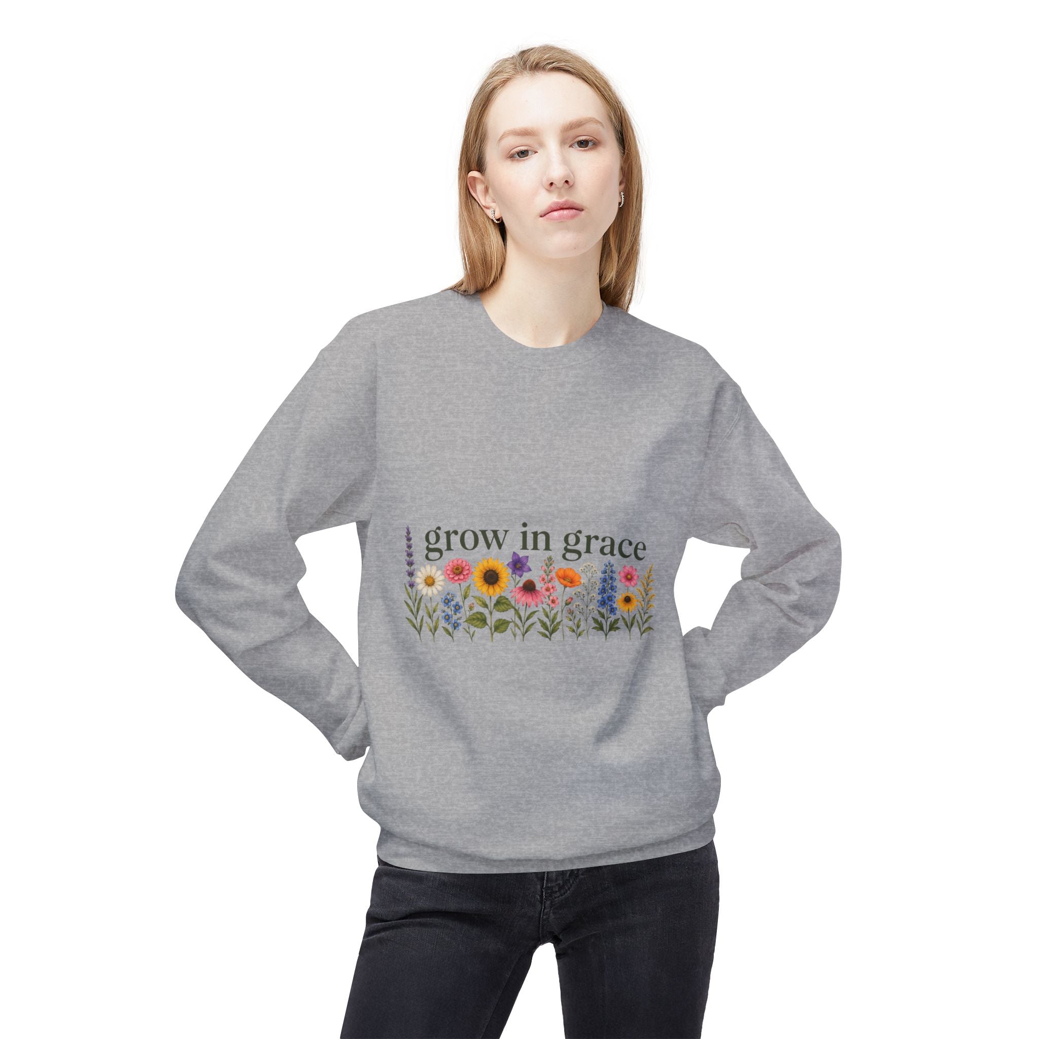Model wearing a Grow In Grace Flowers Sweatshirt with floral design in a cozy, casual setting.
