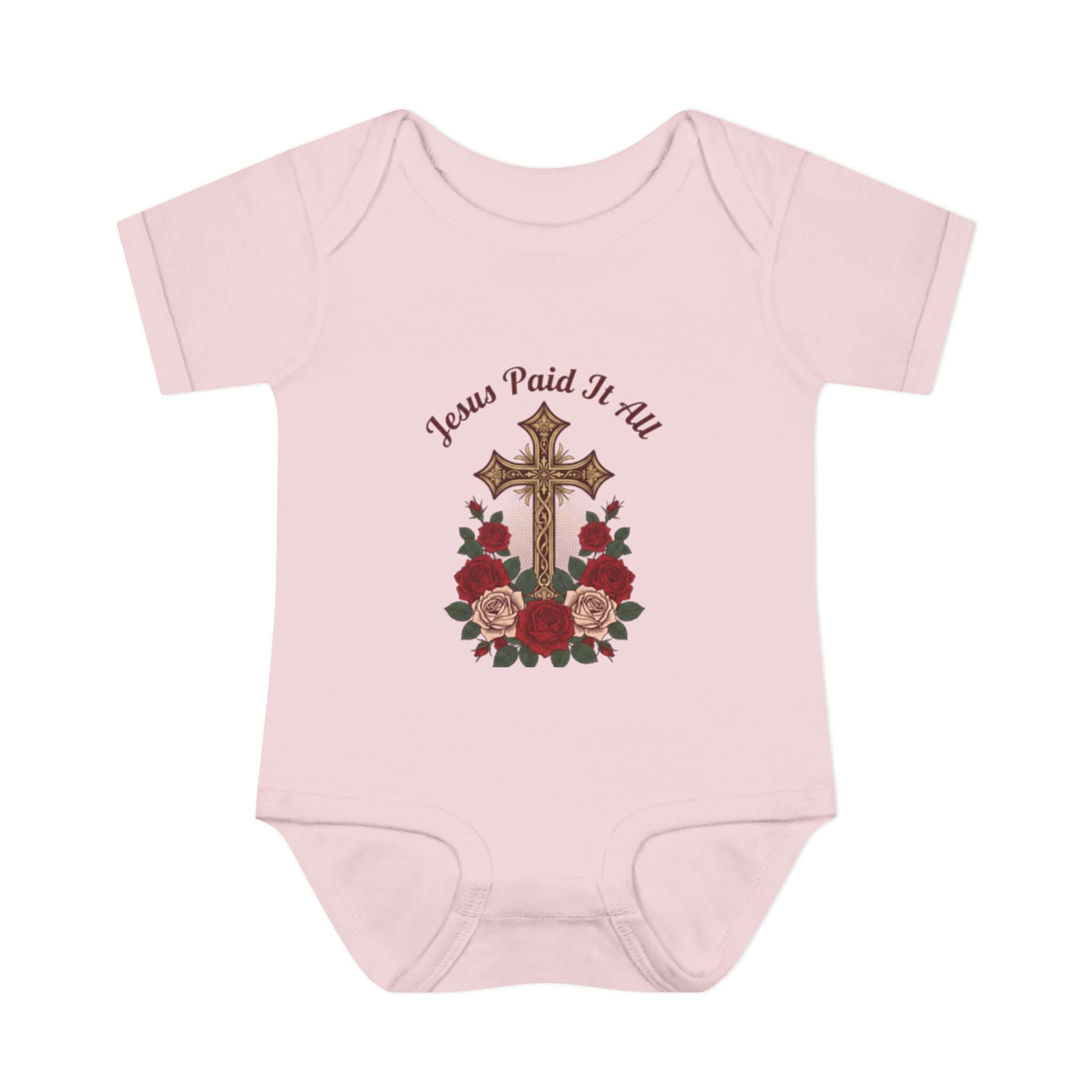 Baby Apparel Light Pinkinfant bodysuit featuring cross and "Jesus Paid It All" design with floral accents.