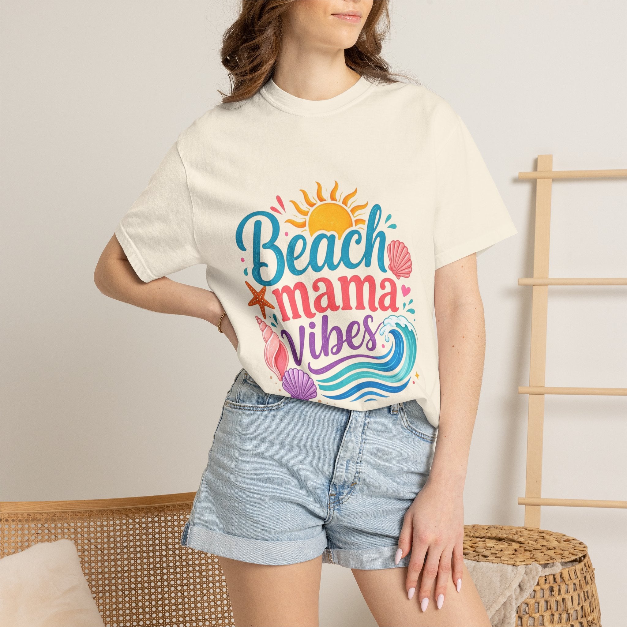 Beach Mama T-Shirt — Women's Coastal Mom Tee worn by a model, featuring colorful beach-themed graphics.