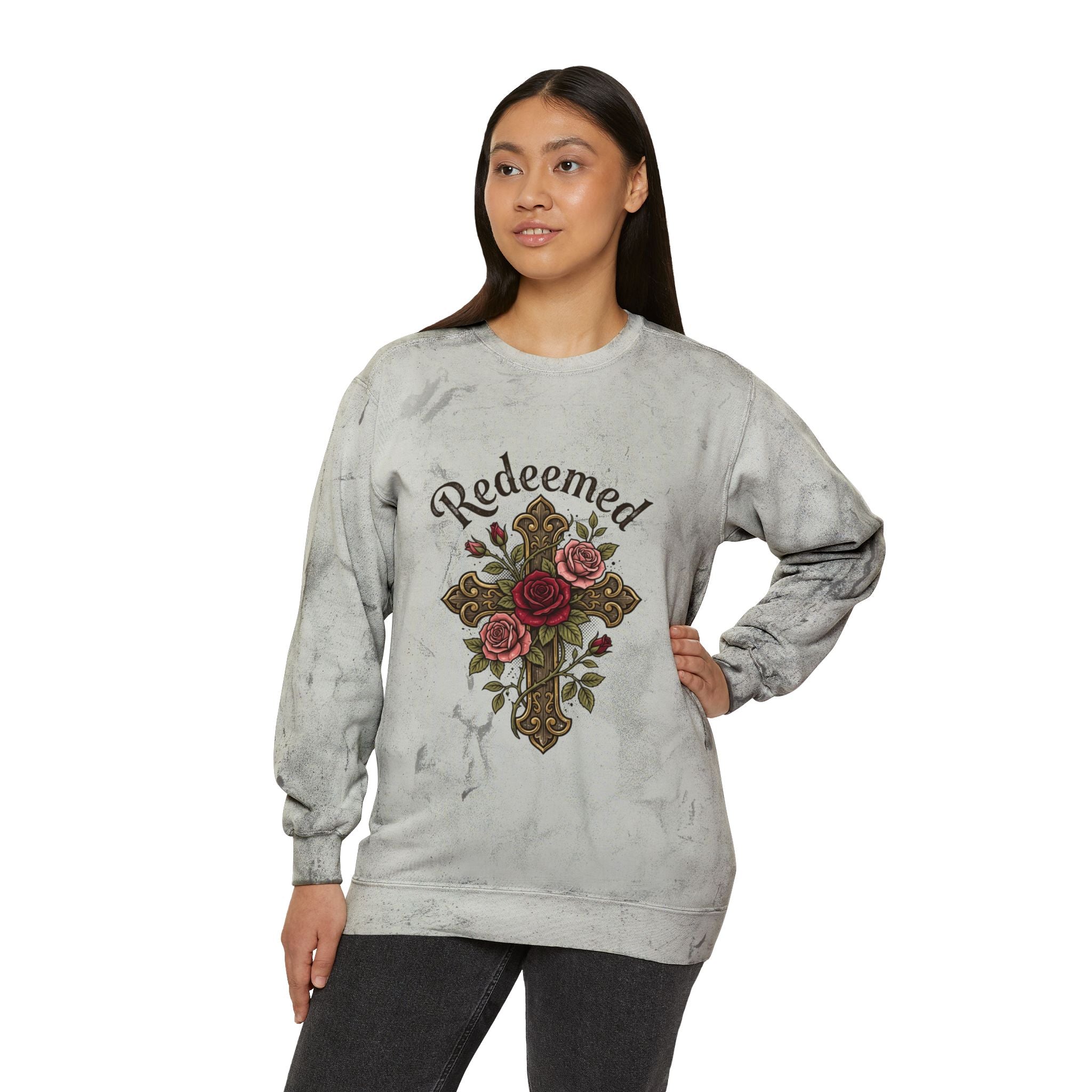 Christian sweatshirt featuring a hand-drawn cross with roses and the word 'Redeemed' on a vintage-style gray Tie-Dye  Pi crewneck.