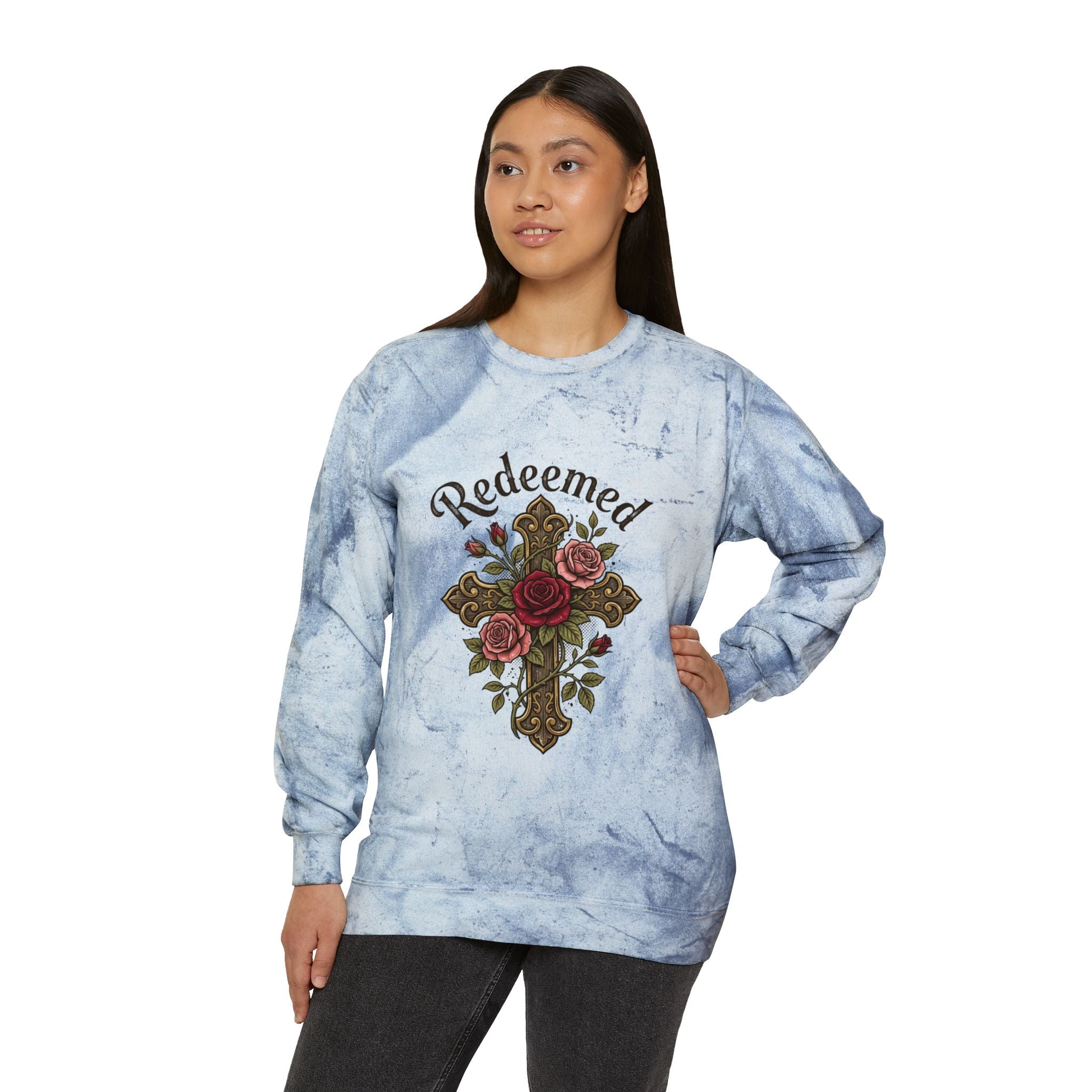 Christian sweatshirt featuring a hand-drawn cross with roses and the word 'Redeemed' on a vintage-style Blue Tie-Dye  Pi crewneck.