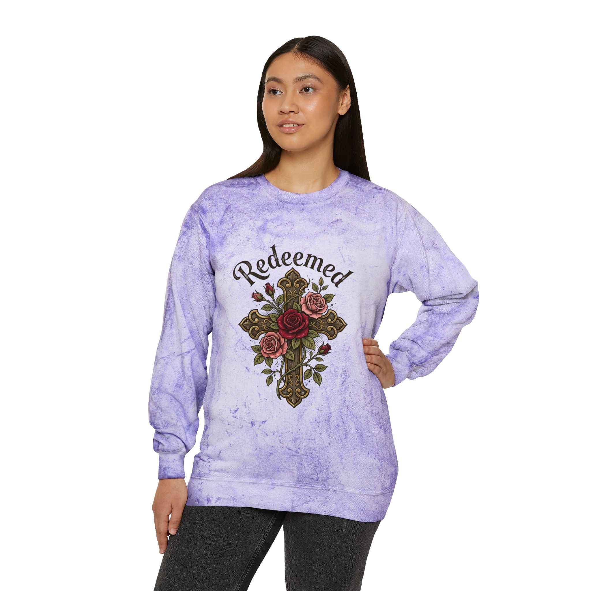 Christian sweatshirt featuring a hand-drawn cross with roses and the word 'Redeemed' on a vintage-style purple Tie-Dye  Pi crewneck.