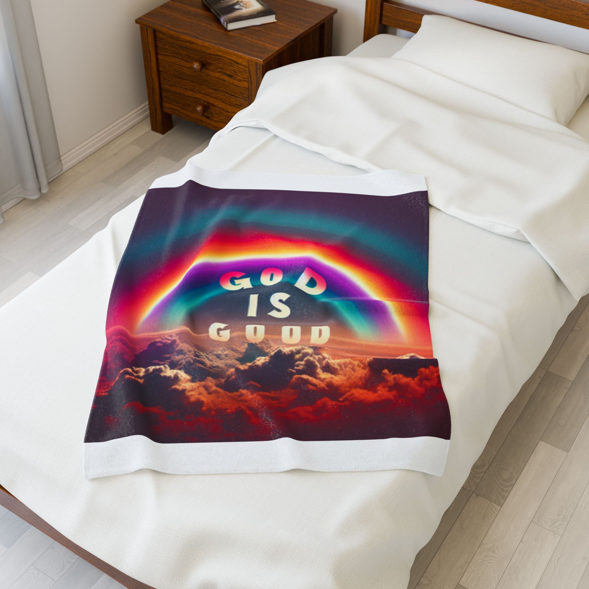God is Good Rainbow Plush Blanket featuring a colorful rainbow design over clouds.