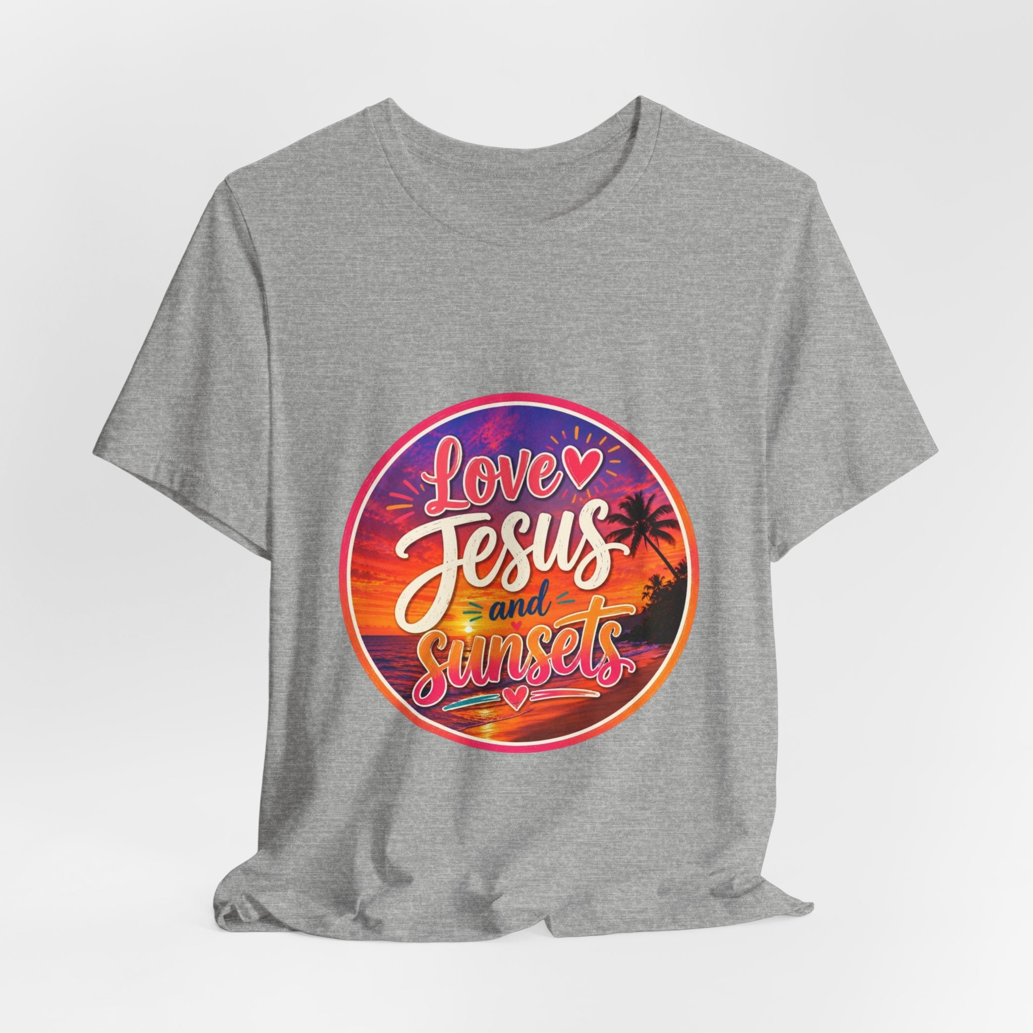 Christian Faith Palm Tree Sunset T-Shirt featuring vibrant print 'Love Jesus and Sunsets' on a gray tee.