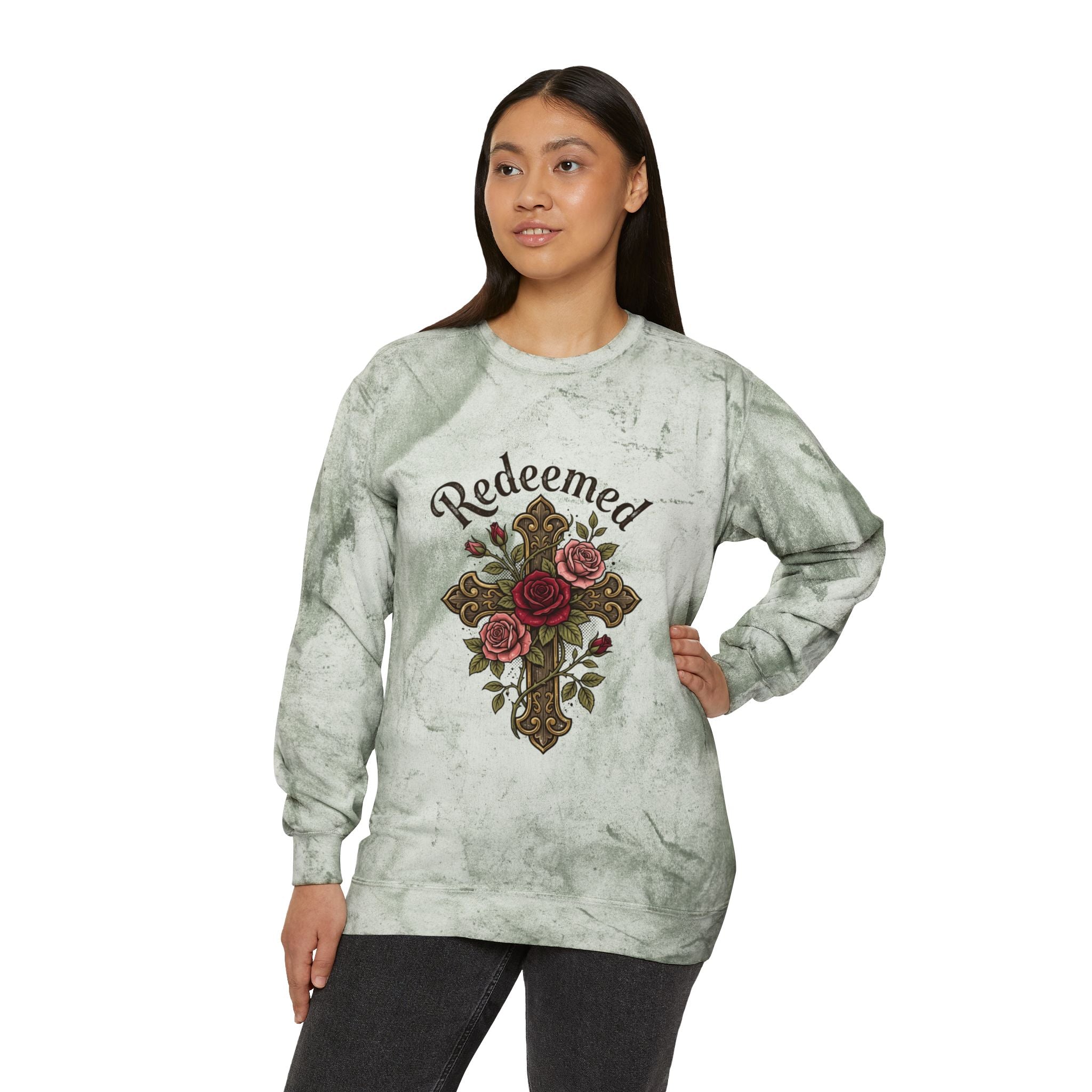 Christian sweatshirt featuring a hand-drawn cross with roses and the word 'Redeemed' on a vintage-style gray Tie-Dye  Pi crewneck.