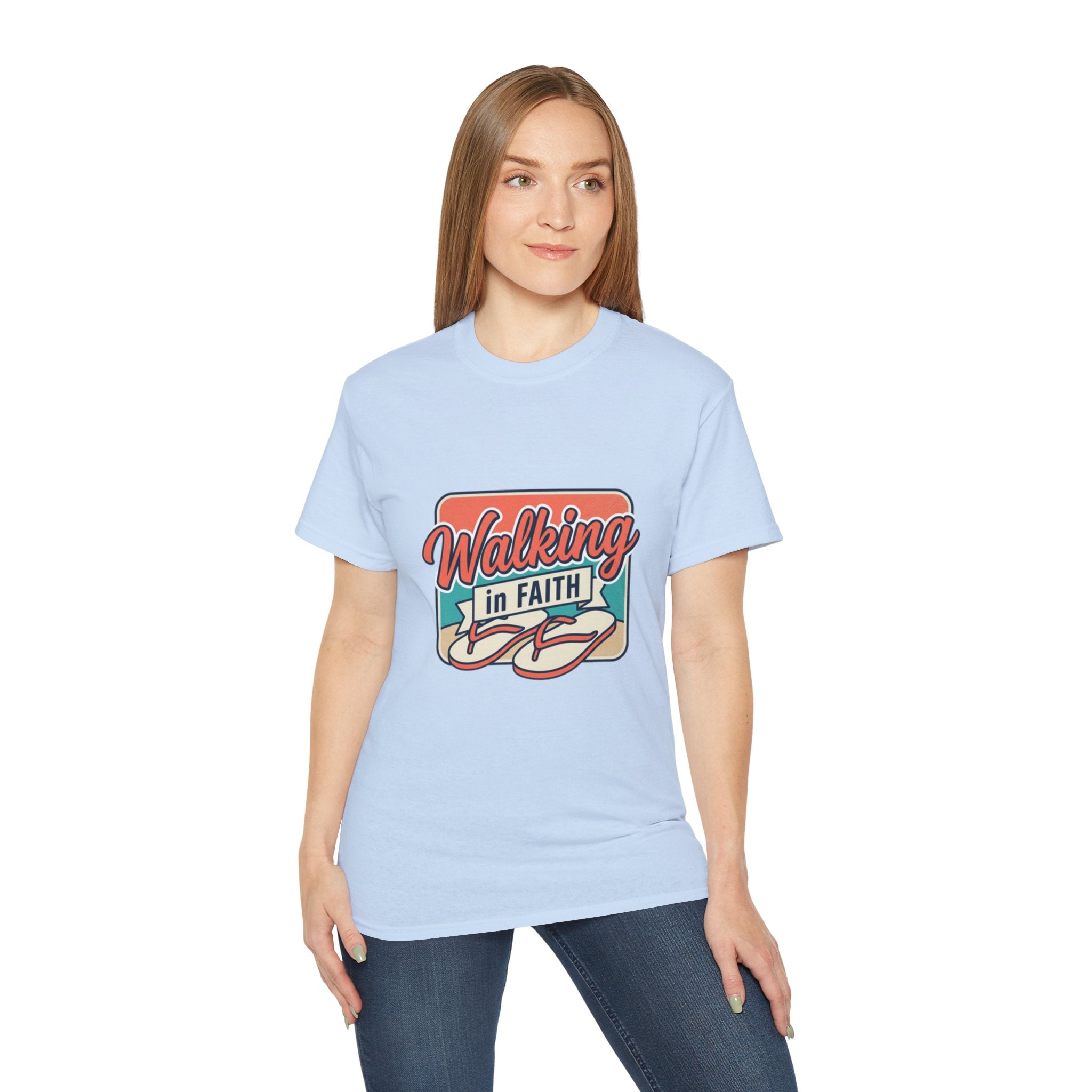 Walking in Faith Beach T-Shirt worn by a woman, featuring a colorful design, perfect for believers.