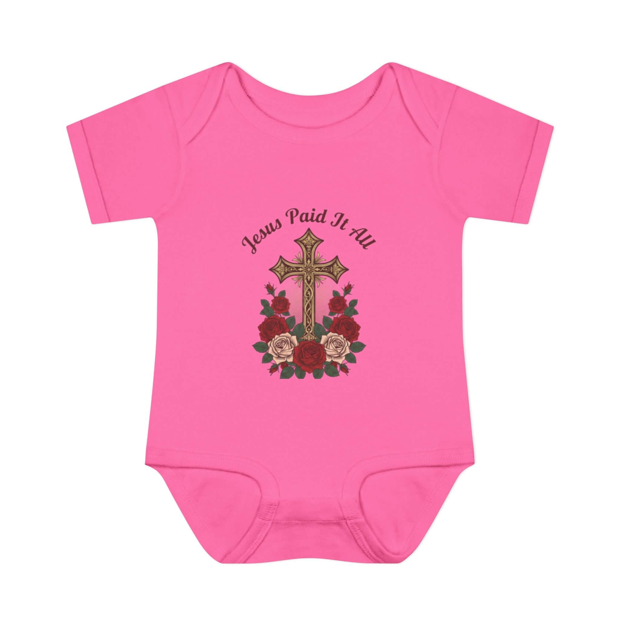 Baby Apparel Pink infant bodysuit featuring cross and "Jesus Paid It All" design with floral accents.