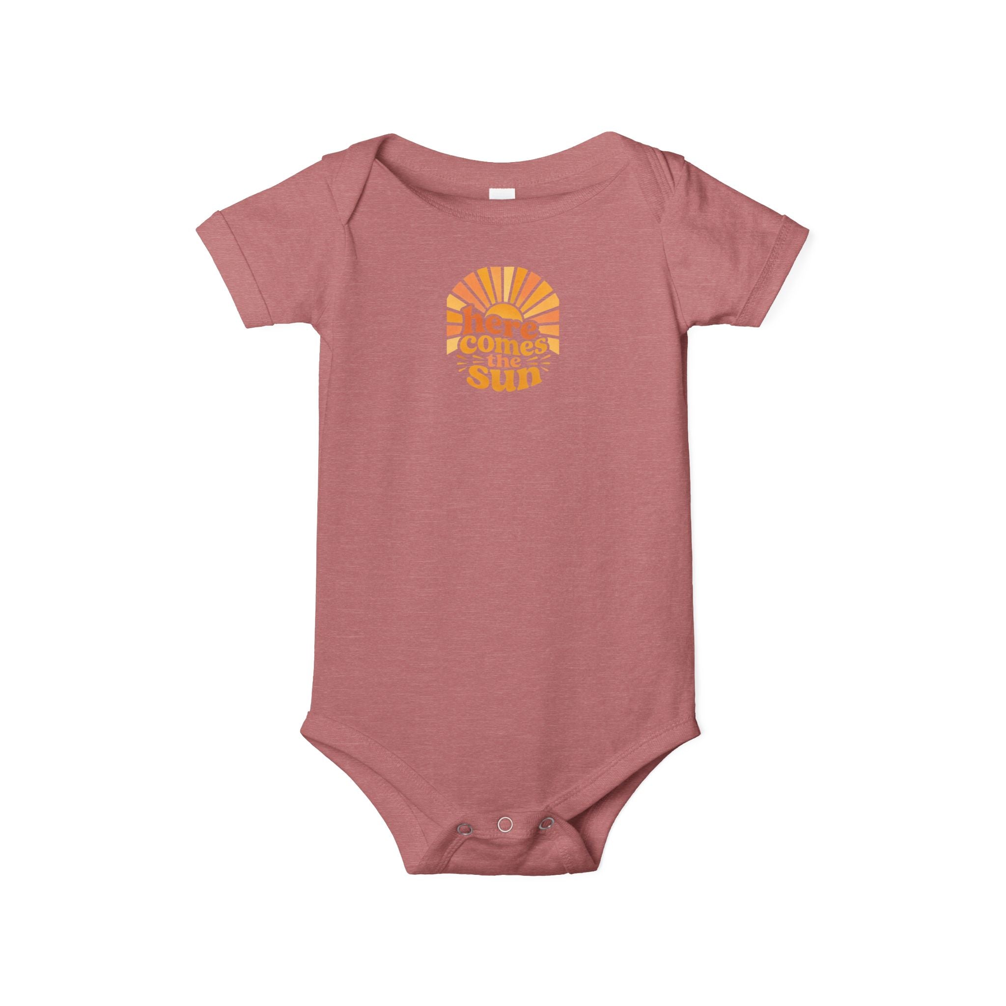 Cute Baby Bodysuit in dusty rose color featuring uplifting phrase 'Here Comes The Sun' design.